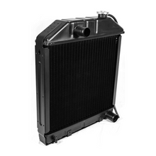 Side view of copper radiator compatible with Ford New Holland 2600, 3000, and 4000 tractors

